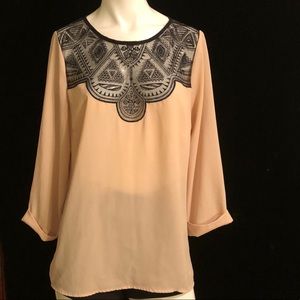 Tan blouse with black lace